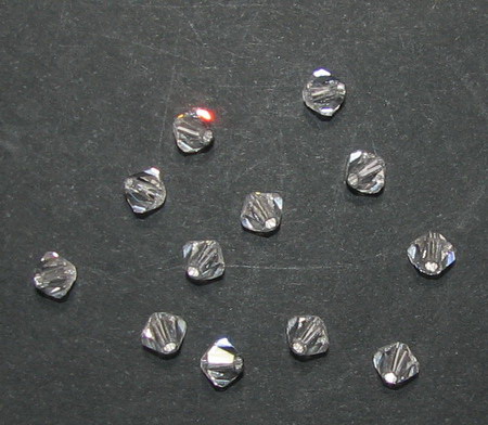 Мънисто Чешки кристал 4x3.6 мм цвят дупка 0.8 мм цвят прозрачно -12 броя