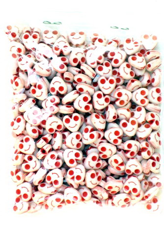 Heart bead with smile 9x9 mm hole 1 mm red - 50 grams ± 240 pieces
