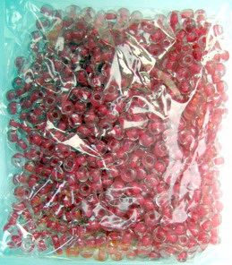 Γυάλινες χάντρες  seed  4 mm διαφανές με βασή γυαλιστερό ροζ -50 γραμμάρια