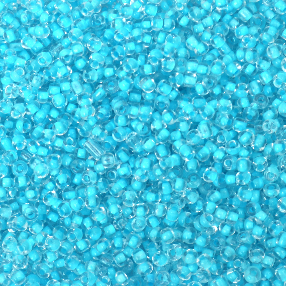 Мъниста стъклена 4 мм прозрачна с нишка синя-50 грама