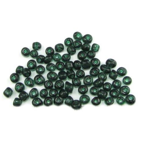 Γυάλινες χάντρες seed 4 mm διαφανές σκούρο πράσινο -50 γραμμάρια