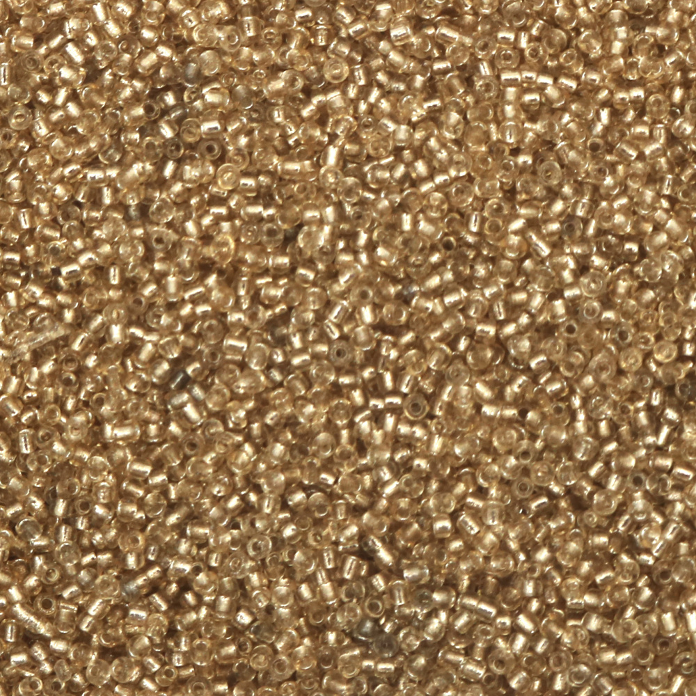 Γυάλινες χάντρες seed  2 mm ασημένιες με βασή χρυσό 2 -50 γραμμάρια