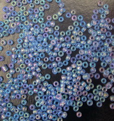 Transparent small glass beads 2 mm tarc blue 2 -50 grams