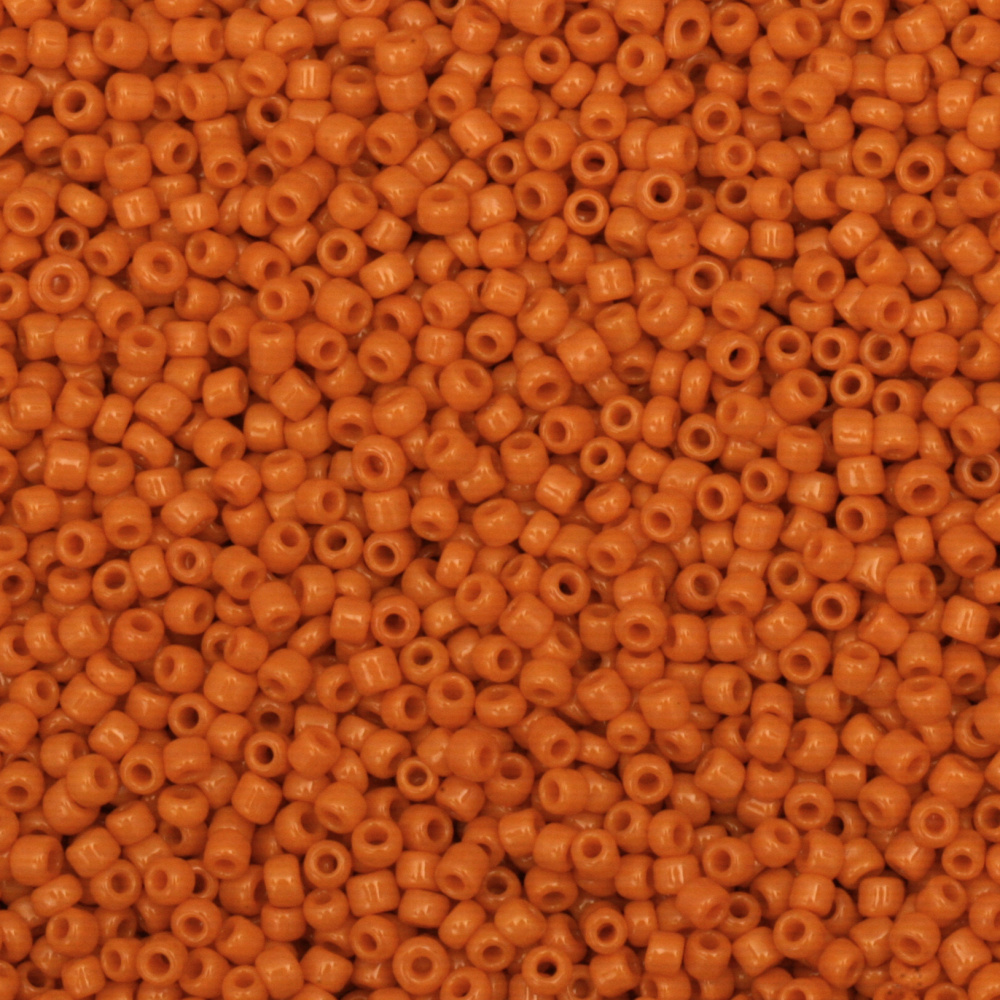 Γυάλινες χάντρες  seed  πάχους 2 mm πορτοκαλί -50 γραμμάρια