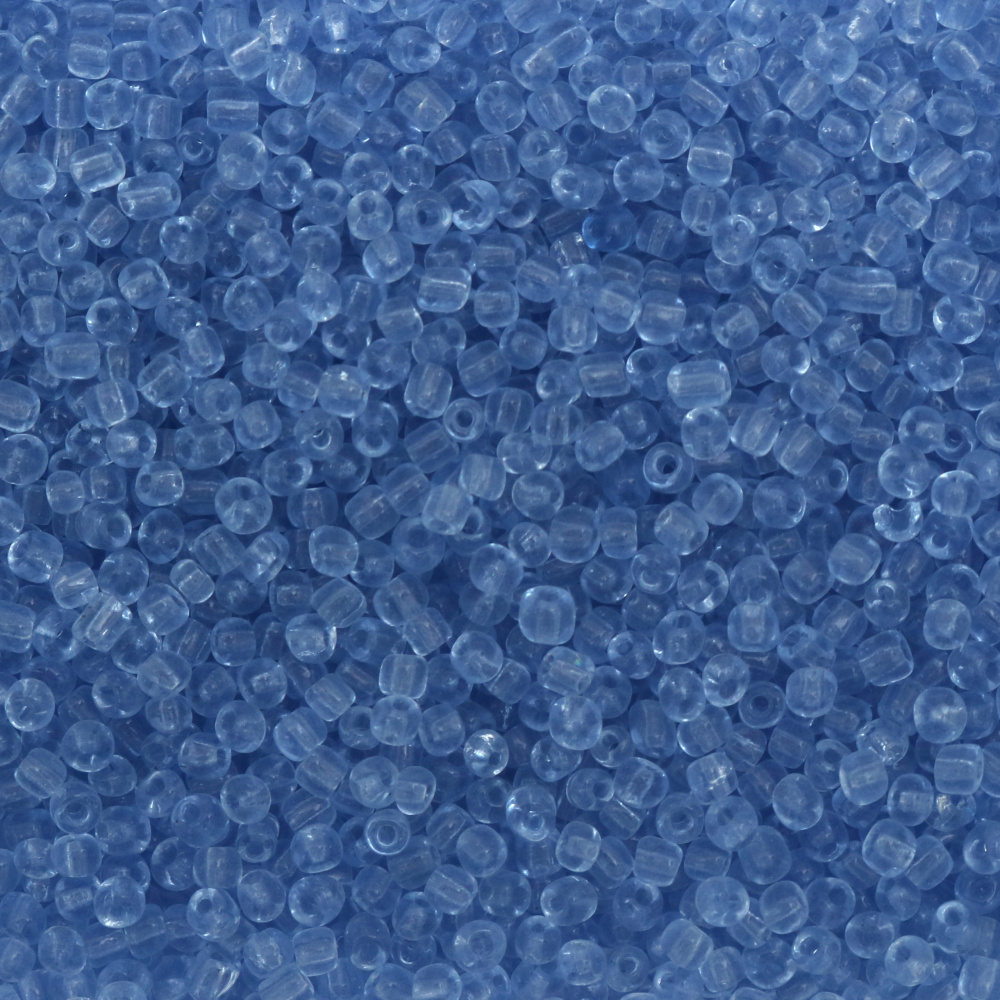 Мъниста стъклена 4 мм прозрачна синя бледа -50 грама