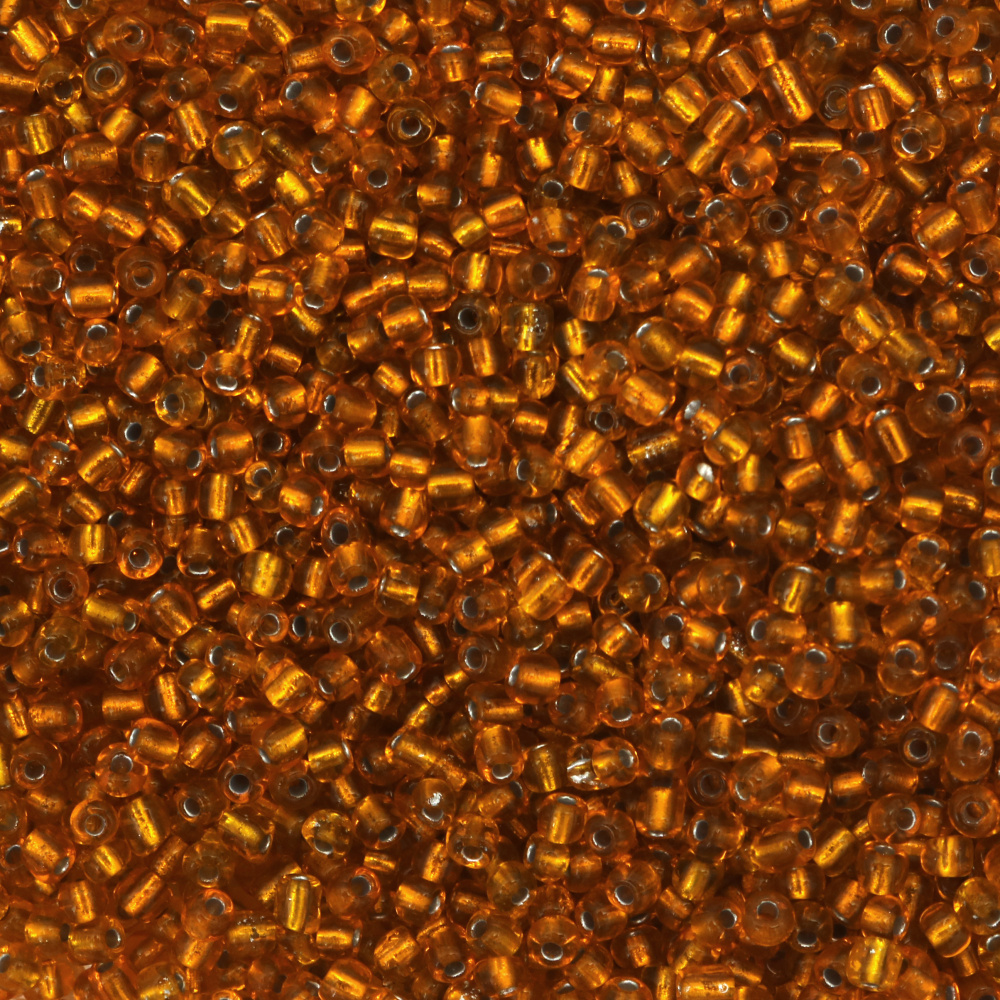 Koraliki szklane rokajl 4 mm, ciemnożółte z nitką w kolorze srebra, 50 g