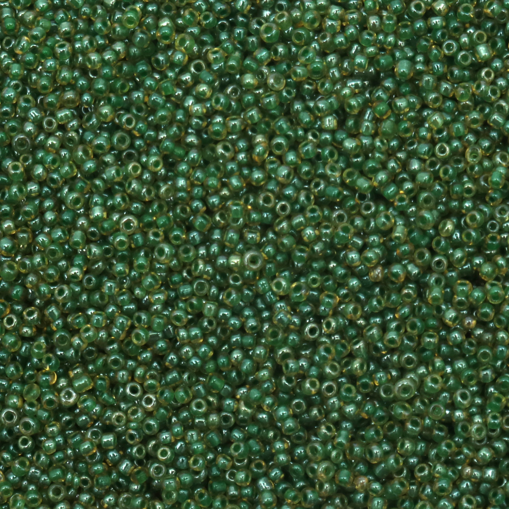 Glass beads 2 mm transparent with a thread of glamorous green -50 grams