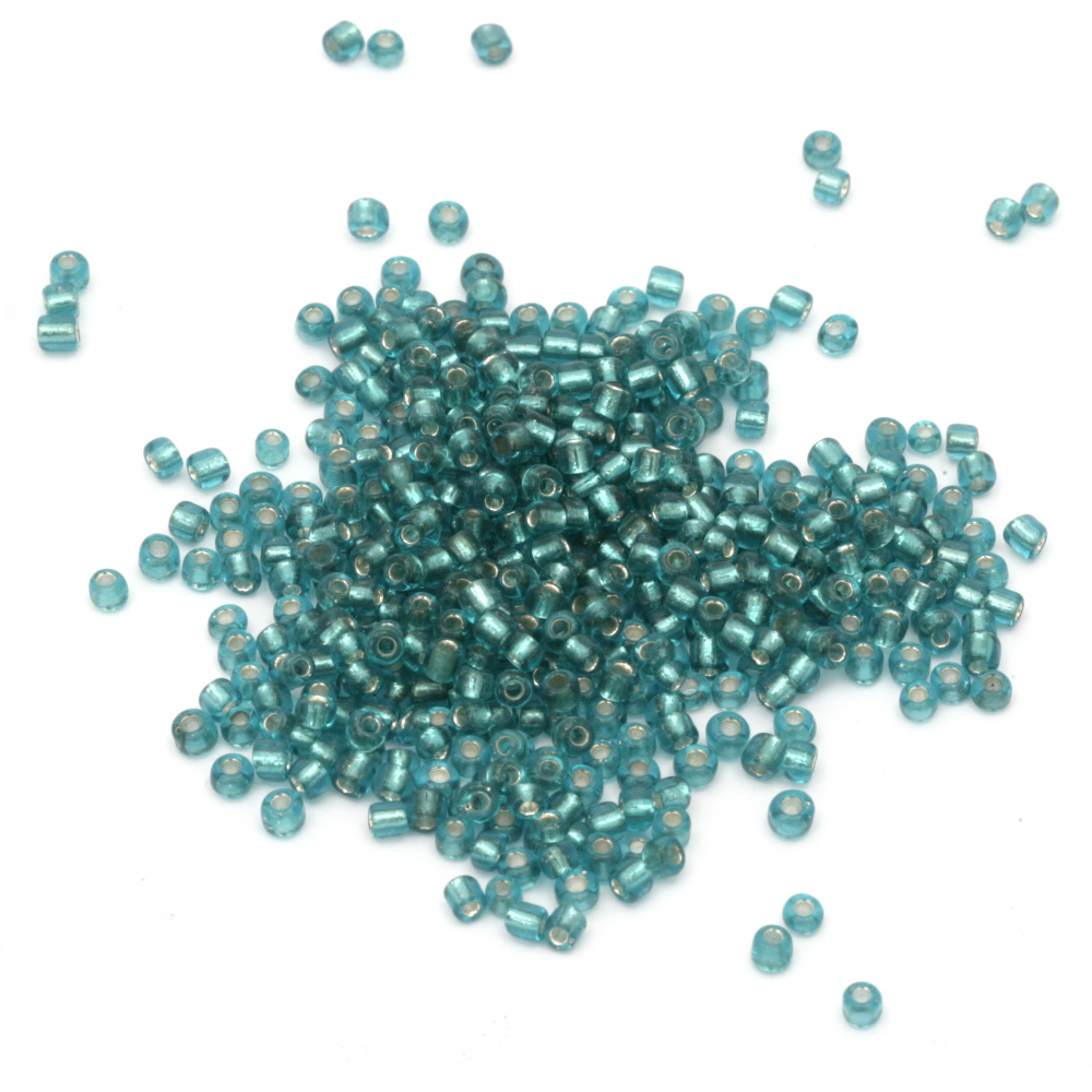 Γυάλινες χάντρες seed  3 mm ασημένιο νήμα ακουαμαρίνη -50 γραμμάρια