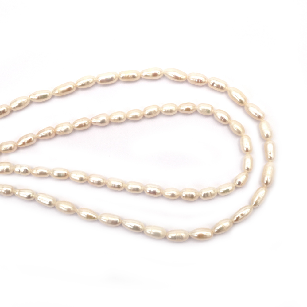 String of beads, natural pearls, 5~5.5x6.5~10 mm, elongated, cream color Grade AA, ~36~44 pieces