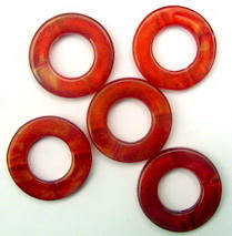 Round mother of pearl red 20mm. with hole 10mm. - 50gr.
