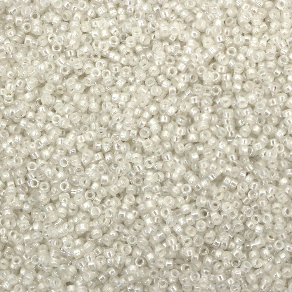 Mărgele de sticlă GLOW tip MIYUKI Delica Rotund 2,7 mm gaură 1,5 mm transparente cu fir alb perlat -20 grame ~1250 buc
