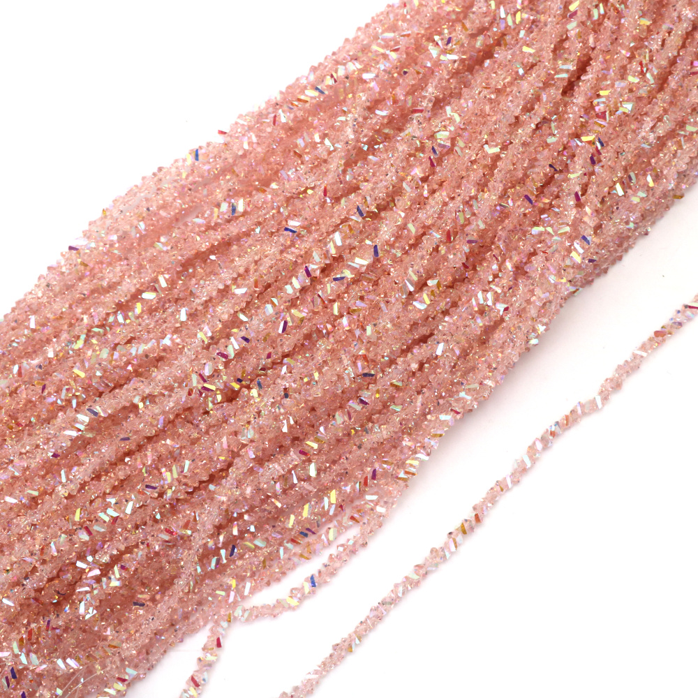 Наниз от кристални мъниста 3x4x3 мм дупка 1 мм фасетиран прозрачен с AB покритие цвят розов дъга ~130 броя