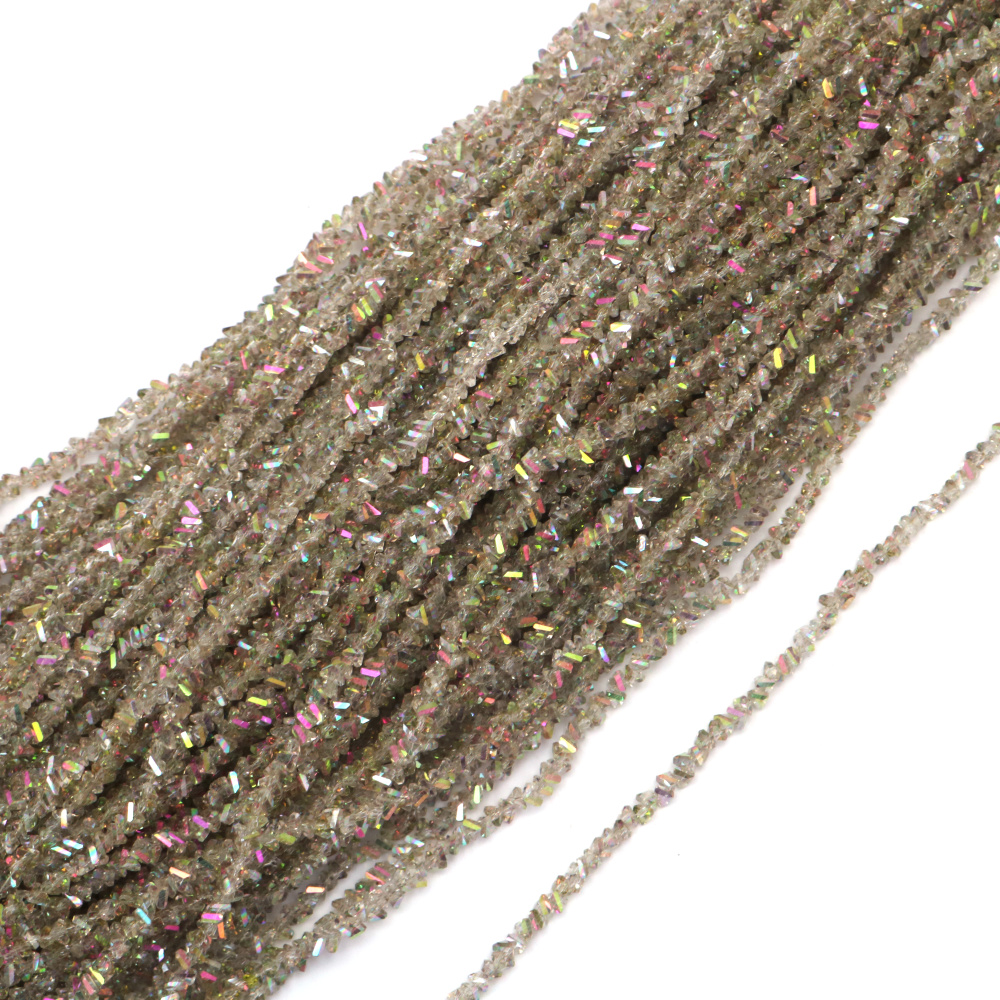 Наниз от кристални мъниста 3x4x3 мм дупка 1 мм фасетиран прозрачен с AB покритие цвят опушен дъга ~125 броя