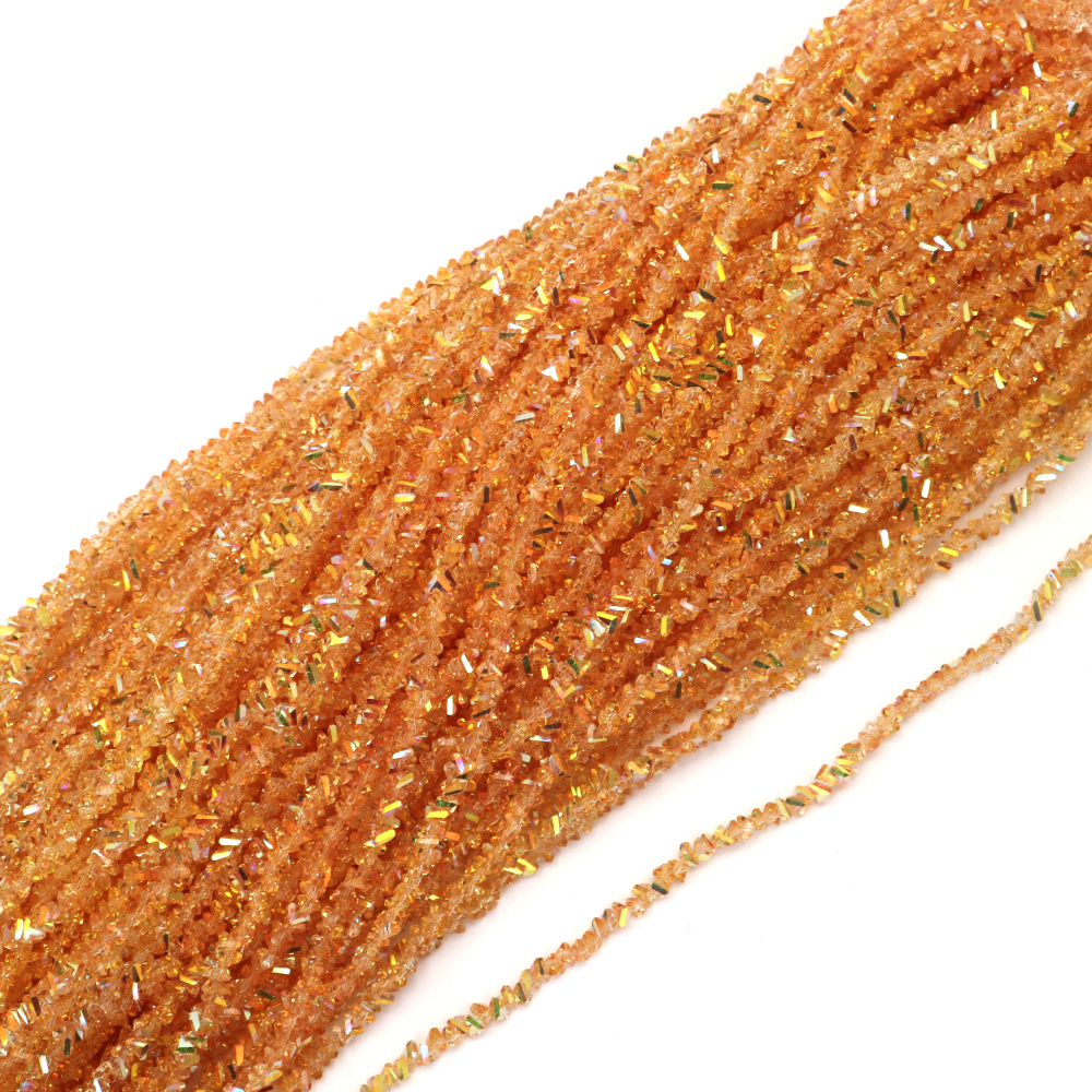 Наниз от кристални мъниста 3x4x3 мм дупка 1 мм фасетиран прозрачен с AB покритие цвят светъл карамел дъга ~130 броя