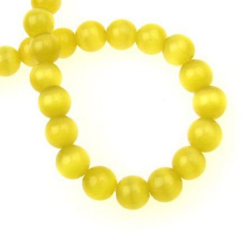 Glass beads  cat's eye bead 8 mm hole 1 mm yellow dark ~ 50 pieces