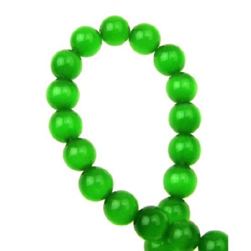 Glass beads  cat's eye ball 8 mm hole 1 mm green dark ~ 50 pieces