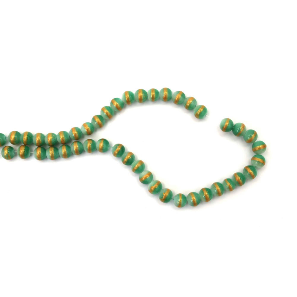 Наниз мъниста стъкло топче 8 мм дупка 1 мм плътно цвят зелен със златен кант ±105 броя