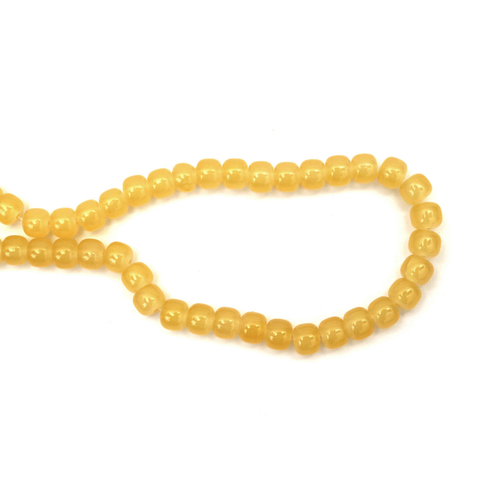 Наниз мъниста стъкло 10x8 мм дупка 1 мм имитация жадеит цвят жълт ±95 броя