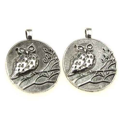 Metal medallion with embossed owl 69x47x6 mm hole 8 mm color old silver