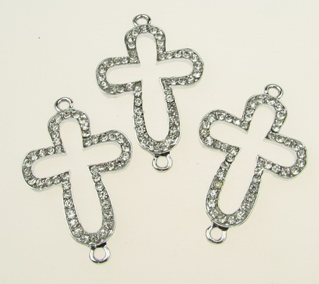 Metal, connecting bead in the shape of a cross with dazzling crystals 41x26 mm hole 2 mm color silver
