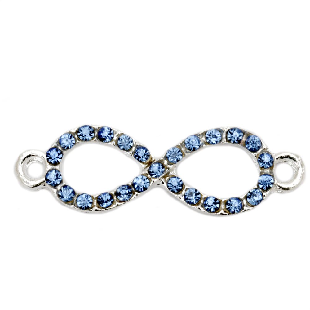Metal, connecting bead in the shape of the infinity sign with blue crystals 32x10 mm hole 2 mm color white