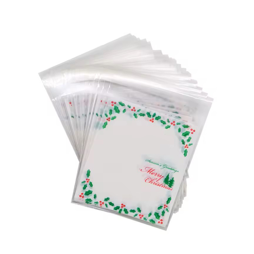 Plic de celofan 10x13 cm, culoarea Crăciunului, transparent, cu spate alb și adeziv - 100 bucăți