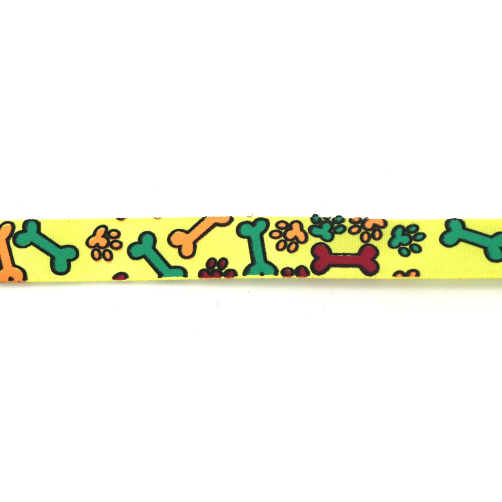 Cinta de raso 15 mm, amarilla con diseño de huesos y huellas - 3 metros