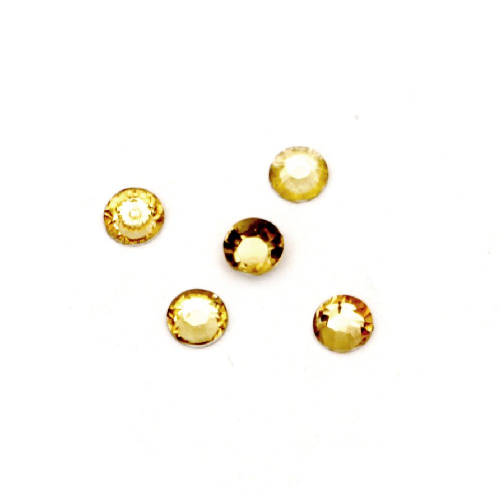 Piatra acrilica pentru lipire de 3 mm forma rotunda  culoare galbena fumurie transparenta fatetata -2 grame ~ 350 bucati