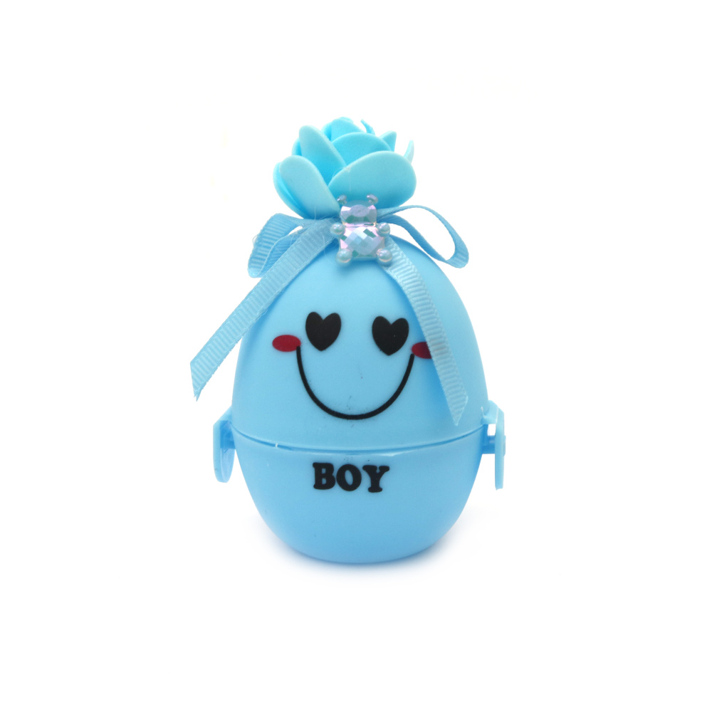 Plastic box in the shape of an egg with decoration, 67x56 mm, color blue