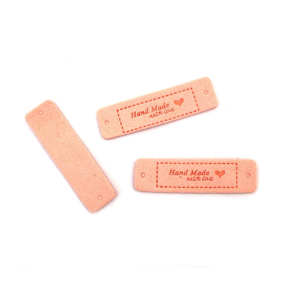 Ετικέτα από μαλακό σουέτ 40x1,5 mm με επιγραφή Handmade και καρδιά,  χρώμα ανοιχτό ροζ - 10 τεμάχια