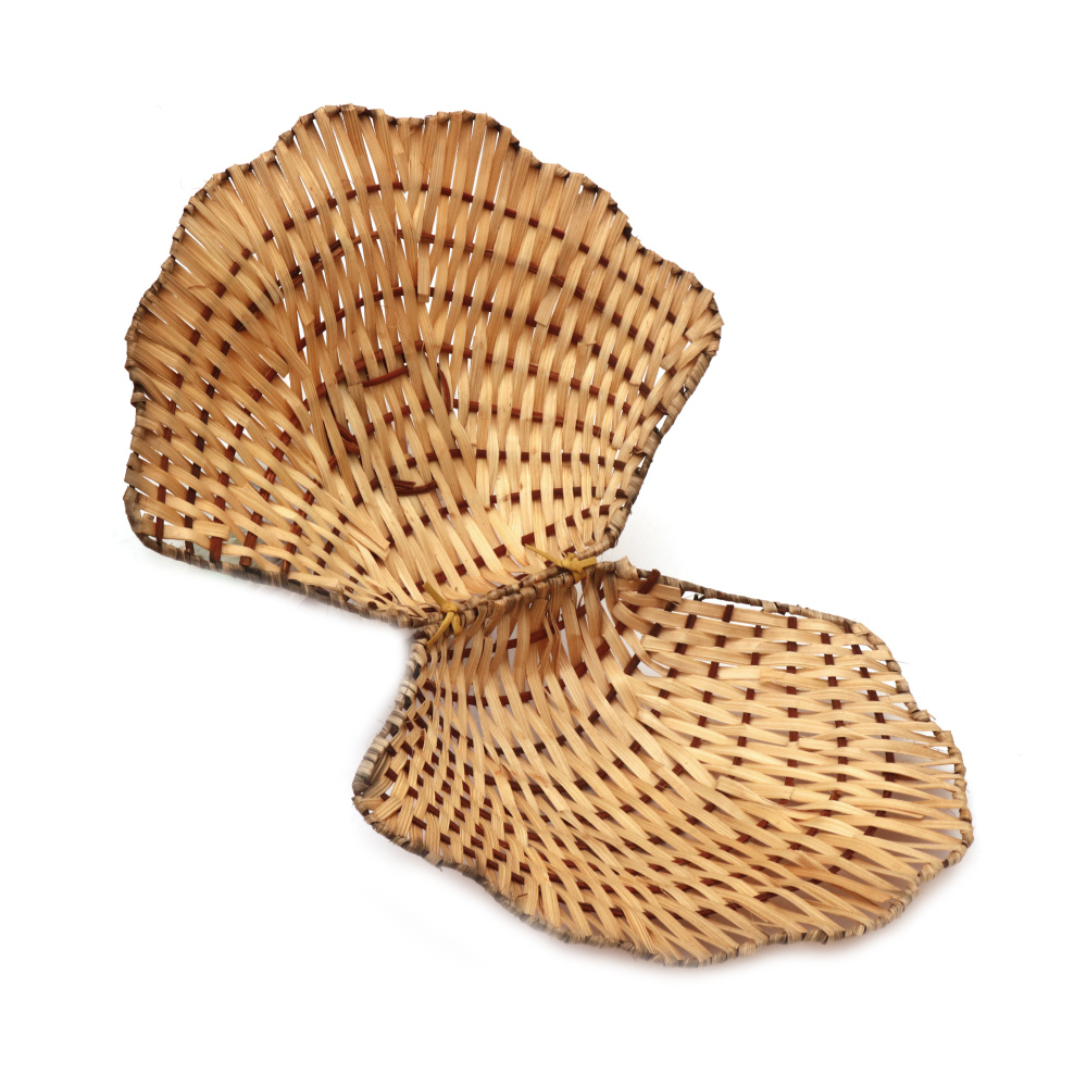 A woven basket for decoration in the shape of a clamshell, made of light wood, 250x190x100 mm