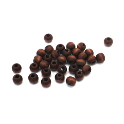 Bilă din lemn  mărgele 9x8 mm gaură 4 mm maro închis -50 grame ~245 bucăți