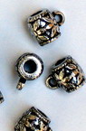 Μεταλλιζέ  χάντρα κύλινδρος με χαλκά  9x11x7 mm τρύπα 3 mm χρώμα ασήμι -50 γραμμάρια ~ 190 τεμάχια