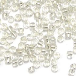 Transparent,glass beads  4 mm silver thread -50 grams