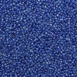 Glass beads with  pearl blue finish2 mm t 3 -50 grams
