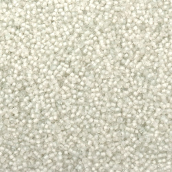 Γυάλινες χάντρες  seed  2 mm διαφανείς με λευκή βασή -50 γραμμάρια