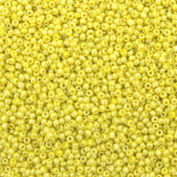 Γυάλινες χάντρες seed   πάχους 3 mm κίτρινο μαργαριτάρι -50 γραμμάρια