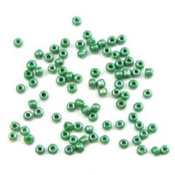 Γυάλινες χάντρες seed   πάχους 3 mm μαργαριτάρι σκούρο πράσινο -50 γραμμάρια
