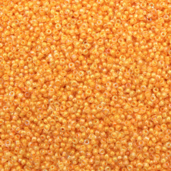 Γυάλινες χάντρες  seed 2 mm διαφανείς με βασή κίτρινο -50 γραμμάρια