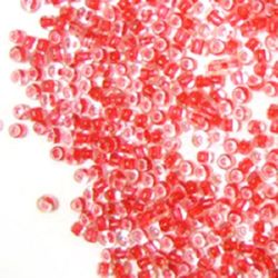 Γυάλινες χάντρες  seed παχους 2 mm διαφανείς με κόκκινη βασή -50 γραμμάρια