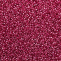 Γυάλινες χάντρες seed   2 mm διαφανές με βασή γυαλιστερό ροζ -50 γραμμάρια
