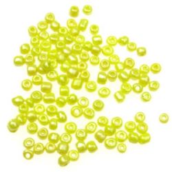 Γυάλινες χάντρες   seed πάχους 4 mm κίτρινο μαργαριτάρι -50 γραμμάρια