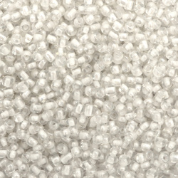 Γυάλινες χάντρες seed  4 mm διαφανείς με βασή γυαλιστερό λευκό  -50 γραμμάρια
