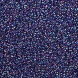 Γυάλινες χάντρες seed 2 mm διάφανες με νήμα μωβ ιριδίζον -50 γραμμάρια