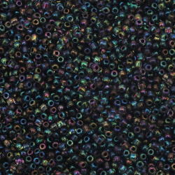 Γυάλινες χάντρες seed 3 mm. διαφανές με βασή μαύρο rainbow -50 γραμμάρια