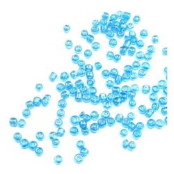 Γυάλινες χάντρες seed 3 mm διαφανές μπλε μαργαριτάρι 1 -50 γραμμάρια