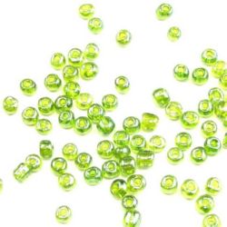 Margele de sticlă 4 mm transparent perlă verde 1 -50 grame