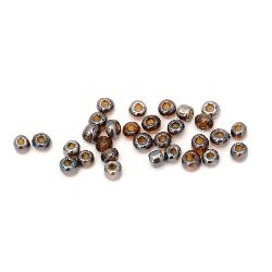 Γυάλινες χάντρες seed 4 mm διαφανές περλέ καφέ -50 γραμμάρια