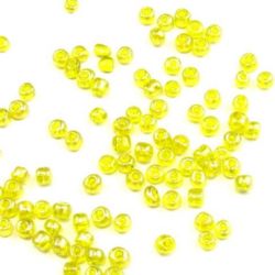 Γυάλινες χάντρες seed 4 mm διαφανές περλέι κίτρινο -50 γραμμάρια