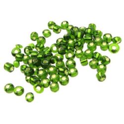 Γυάλινες χάντρες seed 4 mm ασημένιες με βασή πράσινο -50 γραμμάρια